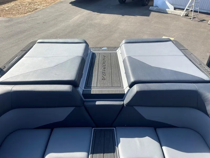 Slide: The Image of 2025 Moomba Mondo boat interior with sleek, modern seating design. - 36