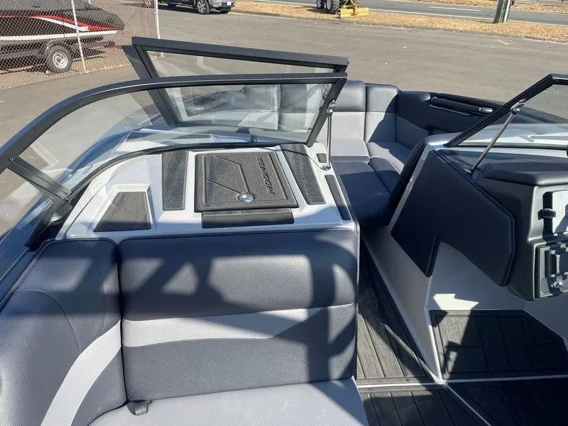 Slide: The Image of 2025 Moomba Mondo boat interior with sleek seating and modern design. - 44