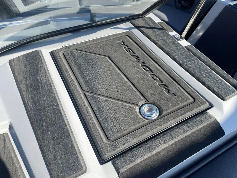 Slide: The Image of 2025 Moomba Mondo boat deck with textured surface and logo. - 46