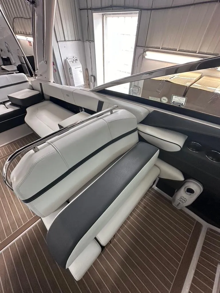Slide: The Image of 2015 Regal 2800 Bowrider interior with sleek seating and modern design. - 12