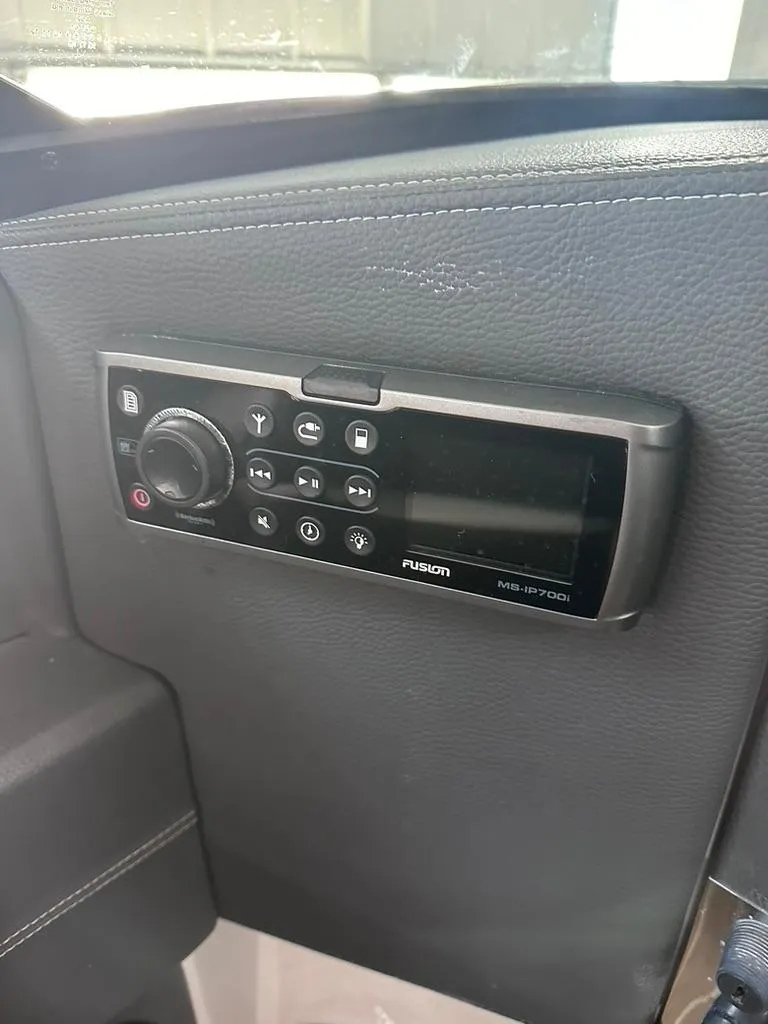 Slide: The Image of Fusion MS-IP700i stereo system on 2015 Regal 2800 Bowrider dashboard. - 17