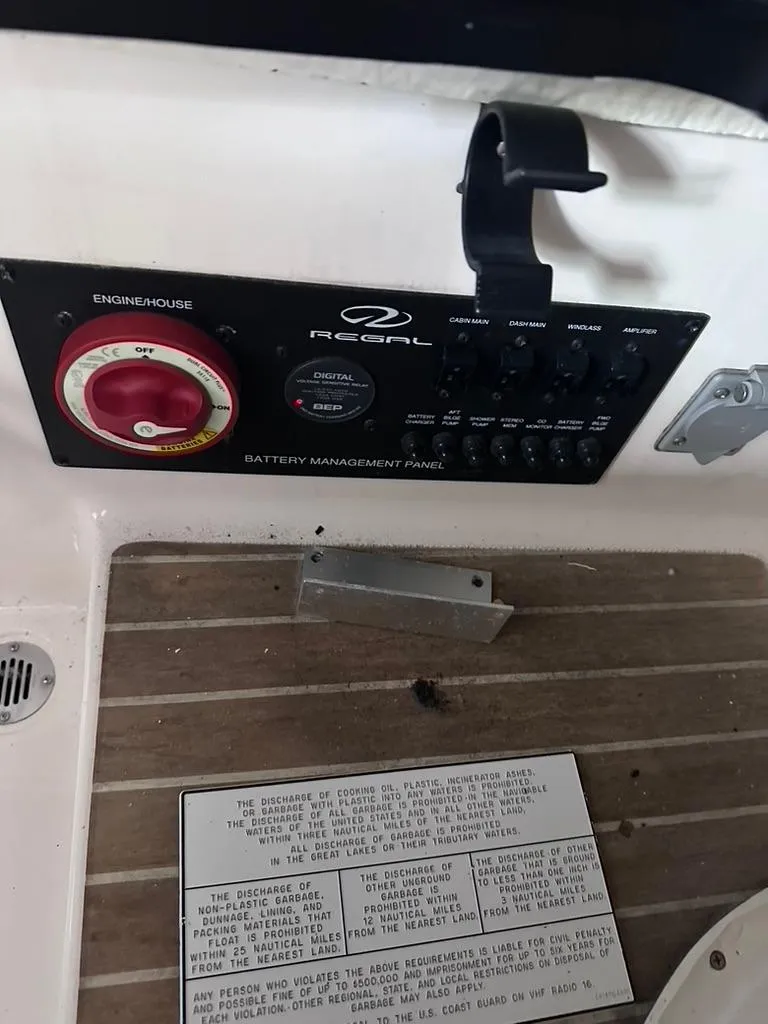Slide: The Image of Regal 2800 Bowrider 2015 battery management panel with control switches. - 19