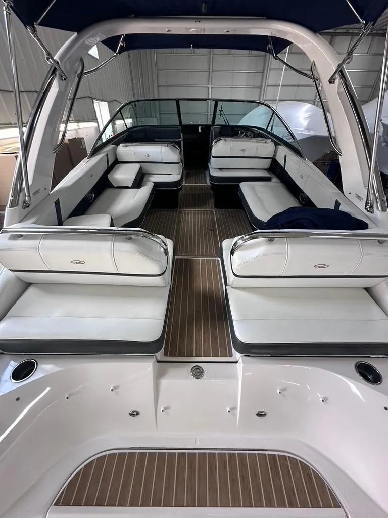 Slide: The Image of 2015 Regal 2800 Bowrider interior with spacious seating and sleek design. - 3