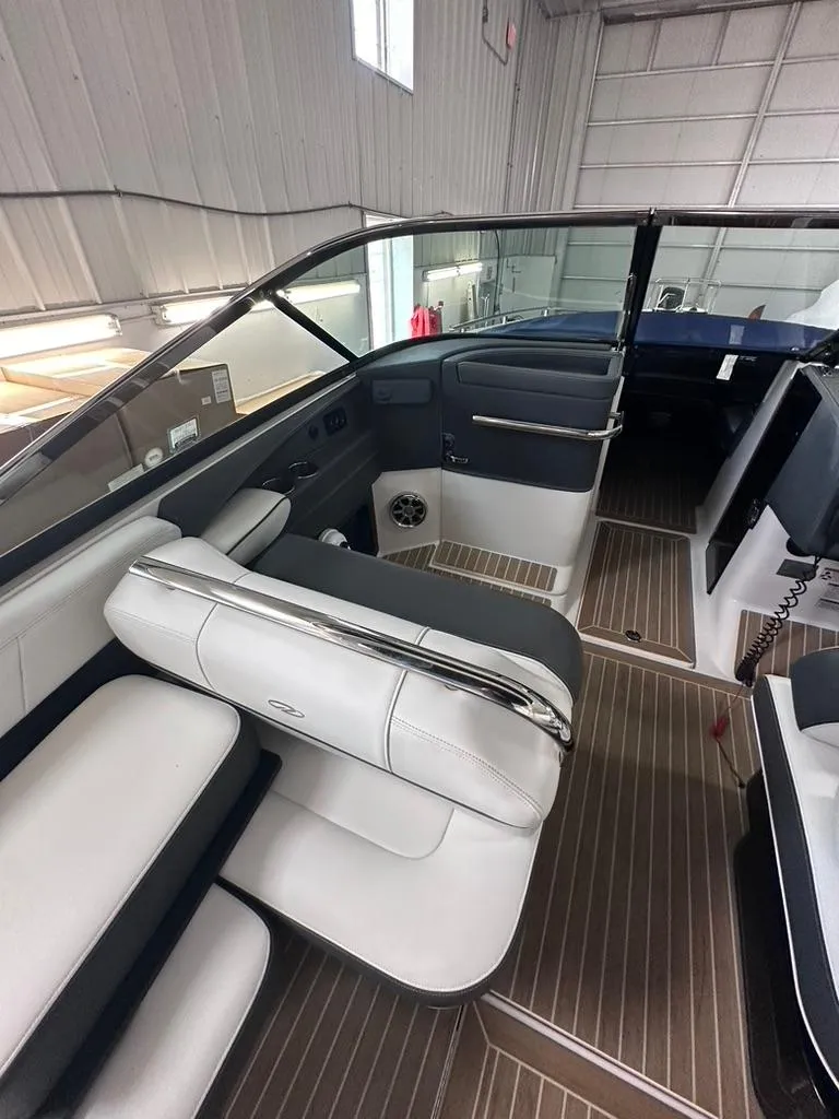 Slide: The Image of 2015 Regal 2800 Bowrider interior with sleek seating and modern design. - 6