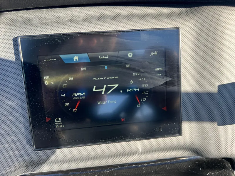 Slide: The Image of Yamaha Boats 2025 SX190 dashboard display showing speed and RPM. - 13
