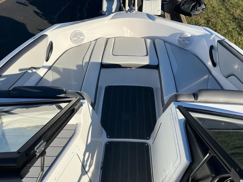 Slide: The Image of 2025 Yamaha Boats SX190 interior with sleek seating and modern design. - 15