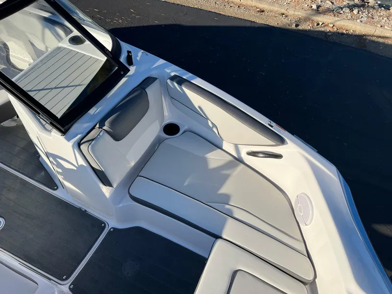 Slide: The Image of 2025 Yamaha Boats SX190 interior with sleek seating and modern design. - 16