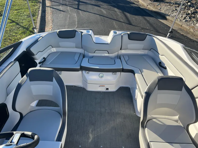Slide: The Image of 2025 Yamaha Boats SX190 interior with sleek seating and modern design. - 18
