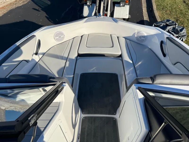 Slide: The Image of 2025 Yamaha Boats SX190 interior, featuring spacious seating and modern design. - 14