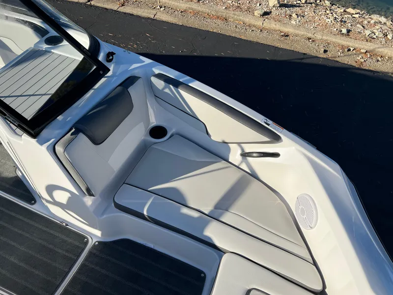 Slide: The Image of 2025 Yamaha Boats SX190 interior with sleek seating and modern design. - 15