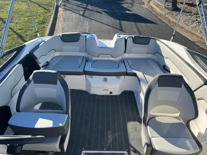 Slide: The Image of 2025 Yamaha Boats SX190 interior with modern seating and sleek design. - 17