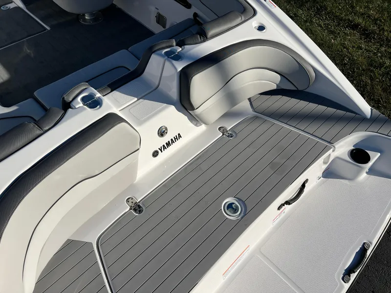 Slide: The Image of 2025 Yamaha SX190 boat interior with sleek seating and modern design. - 8