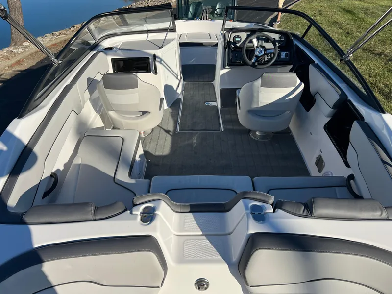 Slide: The Image of 2025 Yamaha Boats SX190 interior with modern seating and sleek design. - 9
