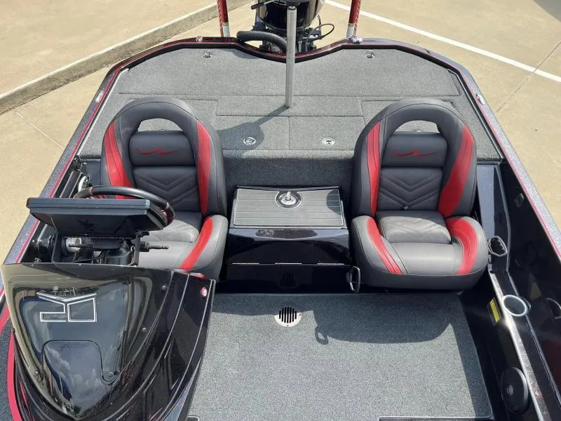 Slide: The Image of 2018 Legend Trailers V20 interior with two seats and steering console. - 13