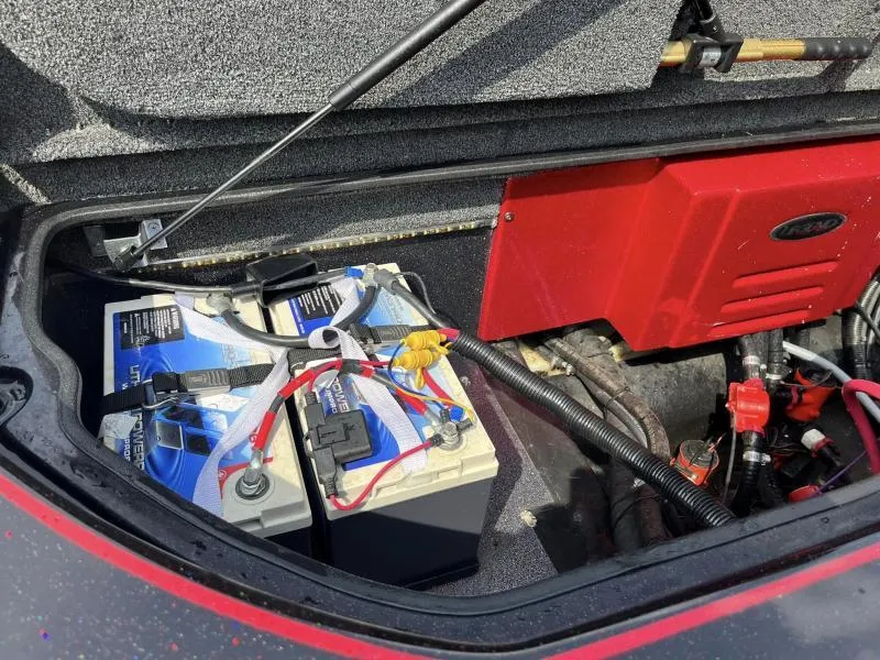 Slide: The Image of 2018 Legend Trailers V20 battery compartment with dual batteries and wiring. - 19