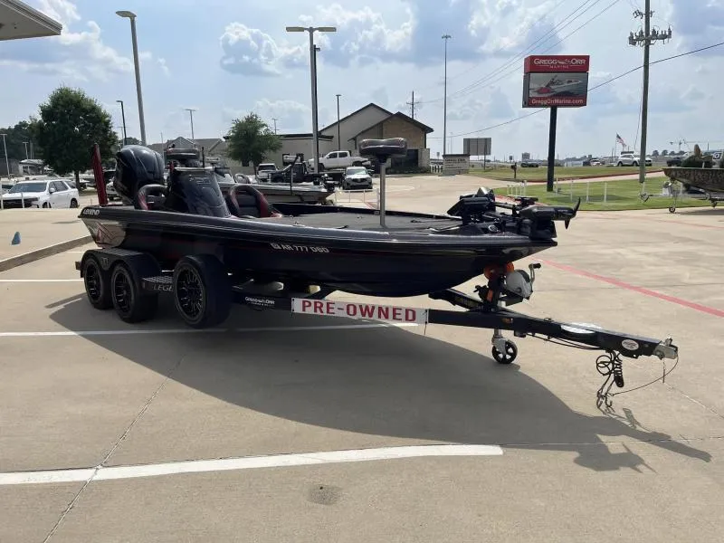 Slide: The Image of Pre-owned 2018 Legend Trailers V20 boat on display in parking lot. - 5