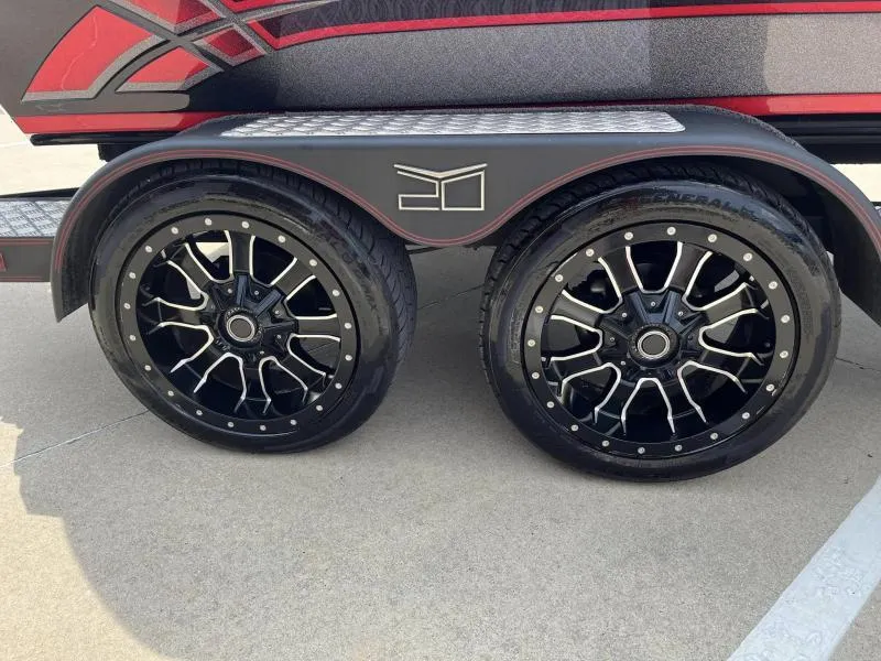 Slide: The Image of 2018 Legend Trailers V20 with stylish black alloy wheels and sleek design. - 6