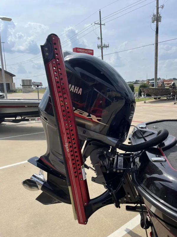 Slide: The Image of 2018 Legend Trailers V20 with Yamaha outboard motor in parking lot. - 7