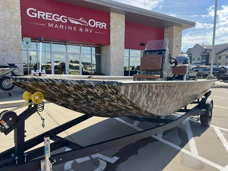 Slide: The Image of 2025 Avid 18 Center Console boat on trailer at Gregg Orr Marine & RV. - 1
