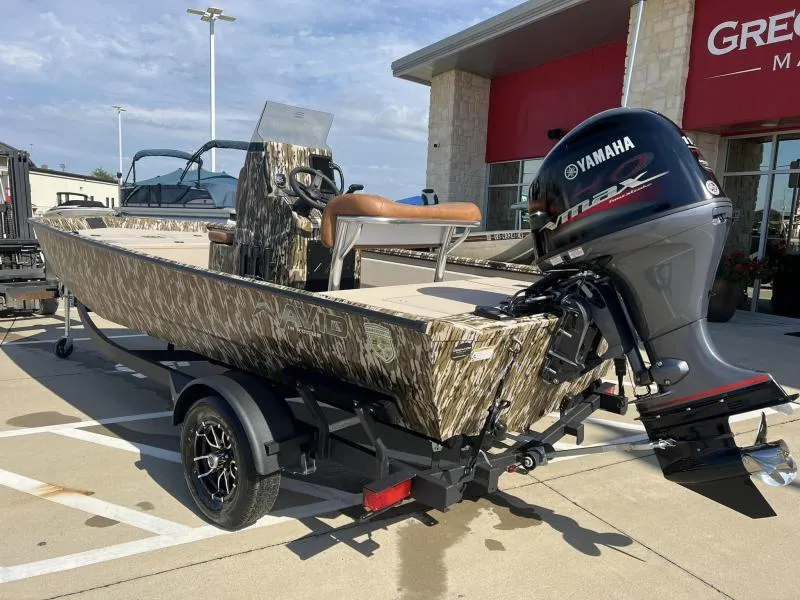 Slide: The Image of 2025 Avid 18 Center Console boat with Yamaha outboard motor on trailer. - 3