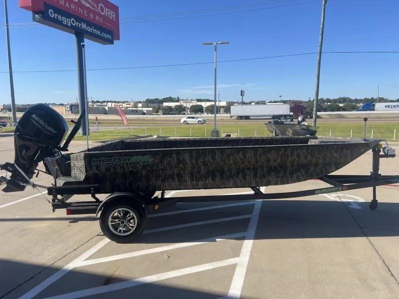 Slide: The Image of 2024 Havoc Boats 1756 MRST on trailer in parking lot, sunny day. - 5