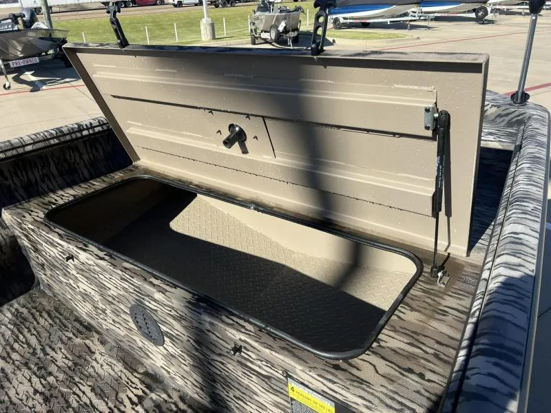 Slide: The Image of Open storage compartment in 2024 Havoc Boats 1756 MRST, showcasing interior space. - 9