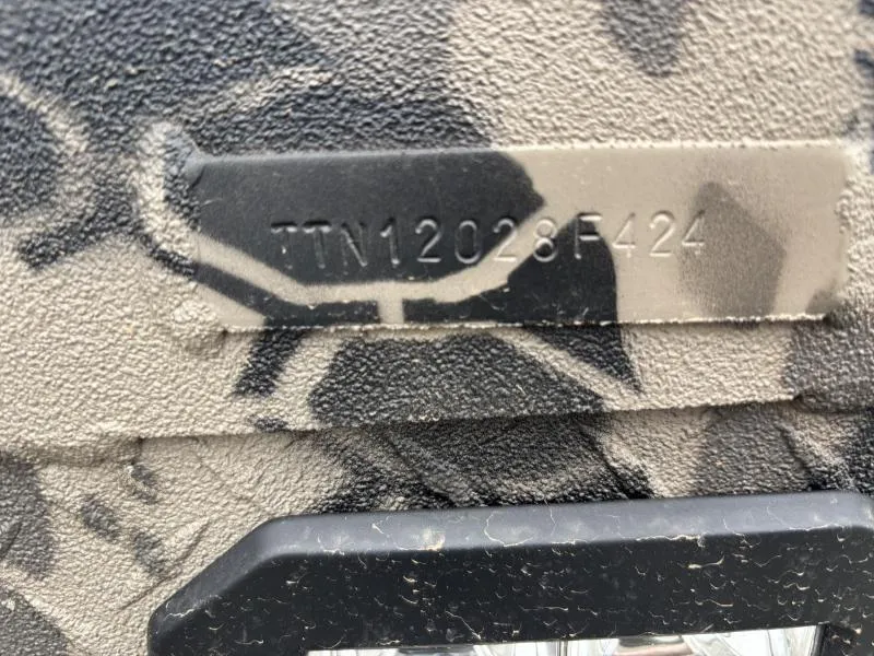 Slide: The Image of 2024 Havoc Boats 1653 MSTC hull identification number on textured surface. - 11