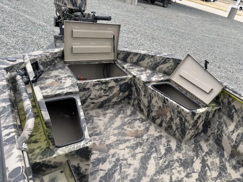 Slide: The Image of 2024 Havoc Boats 1653 MSTC with open storage compartments, camo design. - 8