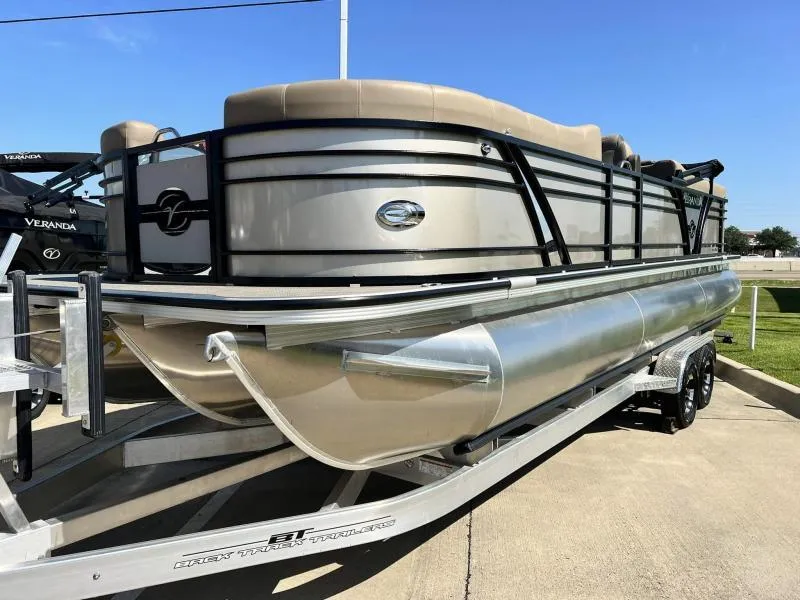 Slide: The Image of 2024 Veranda VTX25RC pontoon boat on trailer, side view. - 2