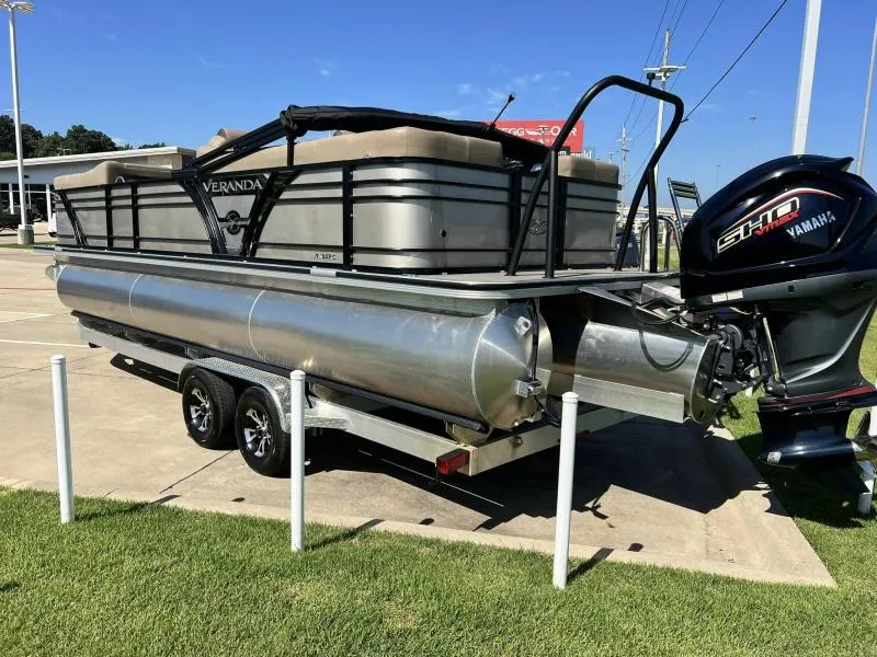 Slide: The Image of 2024 Veranda VTX25RC pontoon boat on trailer with Yamaha engine. - 3