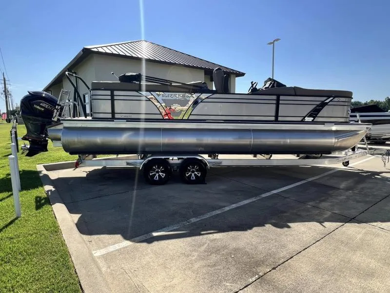 Slide: The Image of 2024 Veranda VTX25RC pontoon boat on trailer in parking lot. - 5