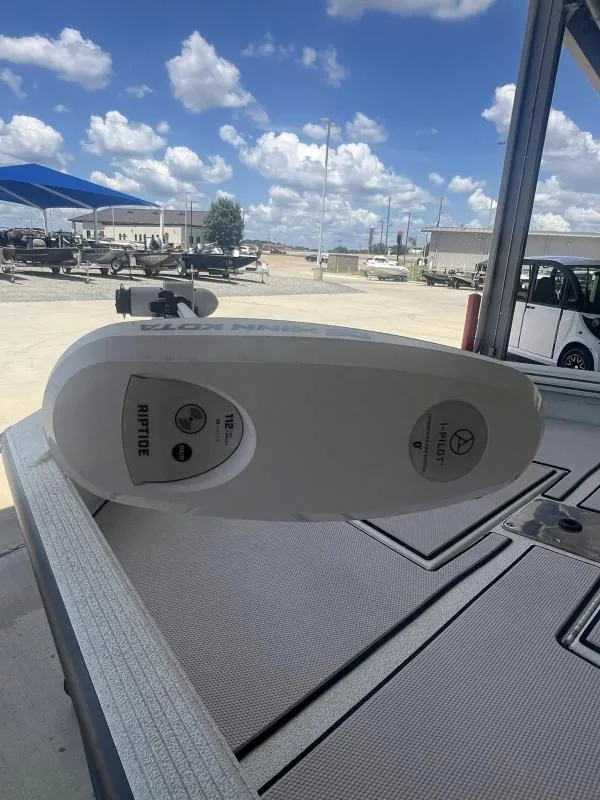 Slide: The Image of 2023 Excel Boats 220 Bay Pro with Riptide motor, outdoor display. - 10