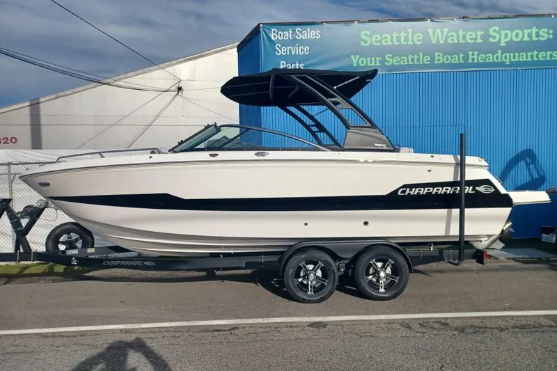 The Image of 2025 Chaparral 247 SSX boat on trailer at Seattle Water Sports dealership. - 0