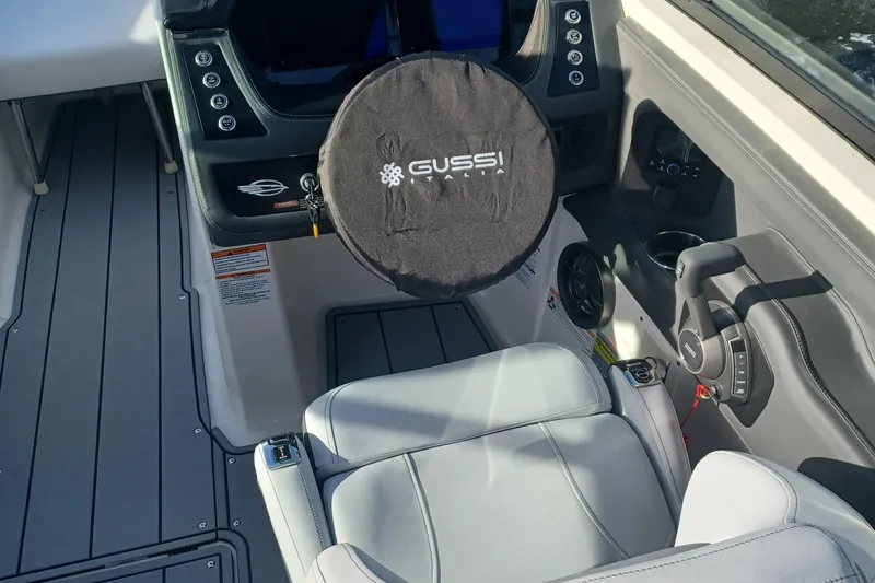 Slide: The Image of Interior of 2025 Chaparral 247 SSX boat with Gussi steering wheel cover. - 18