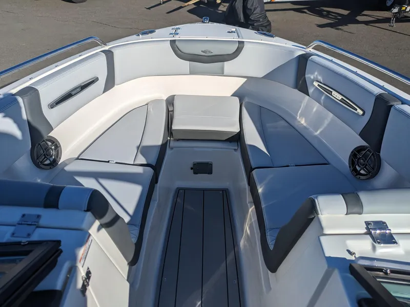 Slide: The Image of 2025 Chaparral 247 SSX boat interior with spacious seating and modern design. - 24