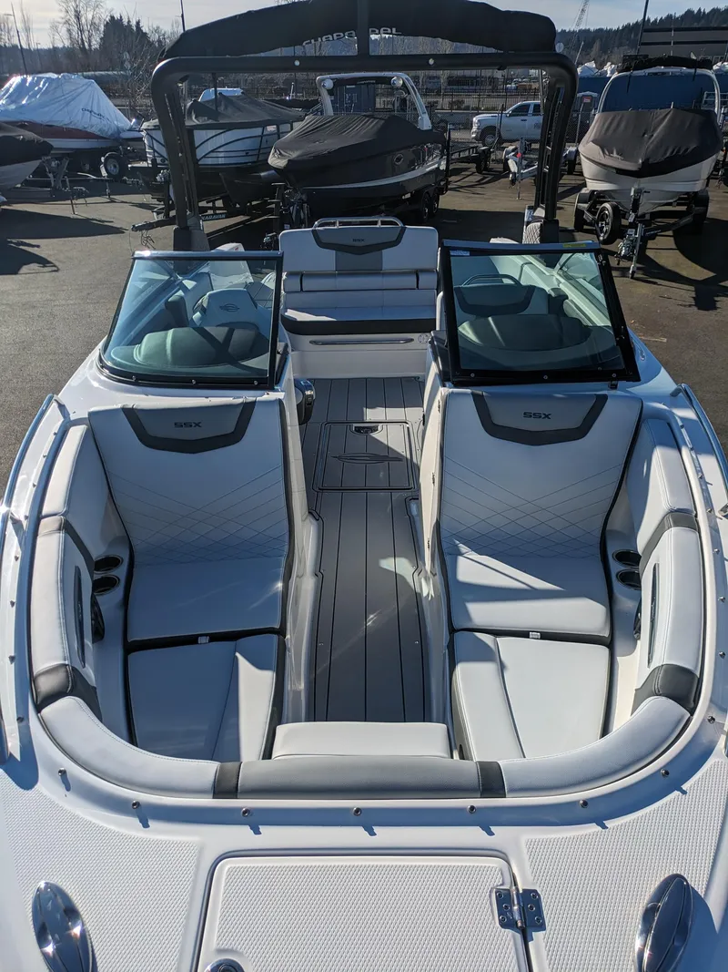 Slide: The Image of 2025 Chaparral 247 SSX boat with sleek interior design and spacious seating. - 7