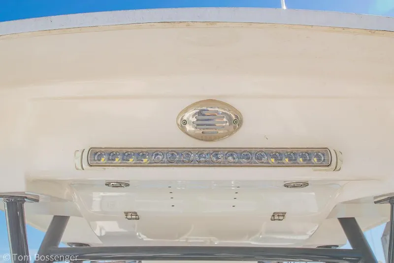 Slide: The Image of 2022 Sea Fox 288 Commander boat roof with LED lights and blue sky background. - 19