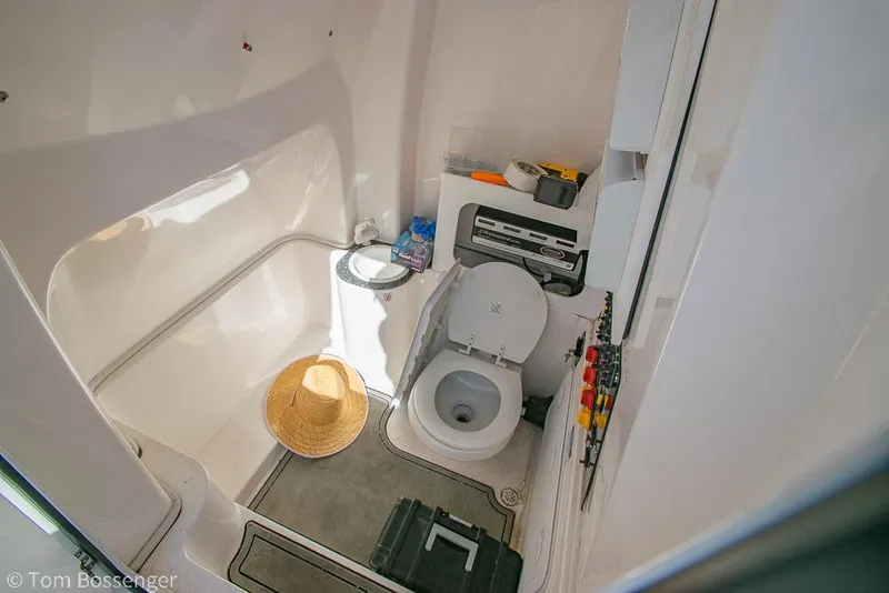 Slide: The Image of 2022 Sea Fox 288 Commander boat interior with toilet and storage area. - 23