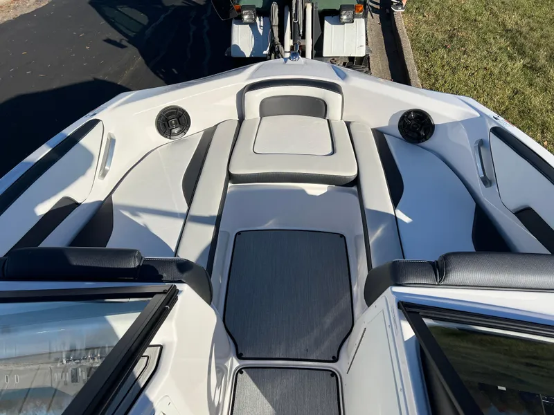 Slide: The Image of 2025 Yamaha Boats SX195 interior with sleek seating and modern design. - 13