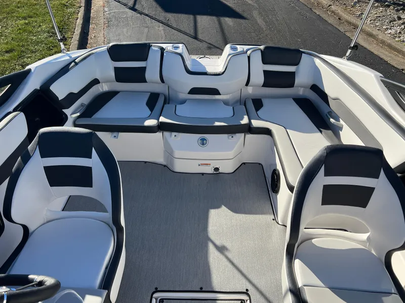 Slide: The Image of 2025 Yamaha Boats SX195 interior with sleek seating and modern design. - 16