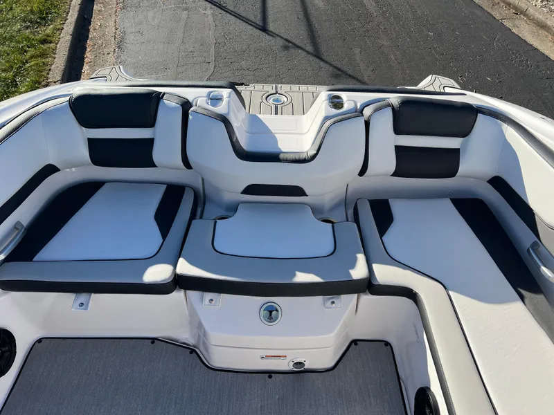 Slide: The Image of 2025 Yamaha Boats SX195 interior seating with sleek design and modern upholstery. - 17