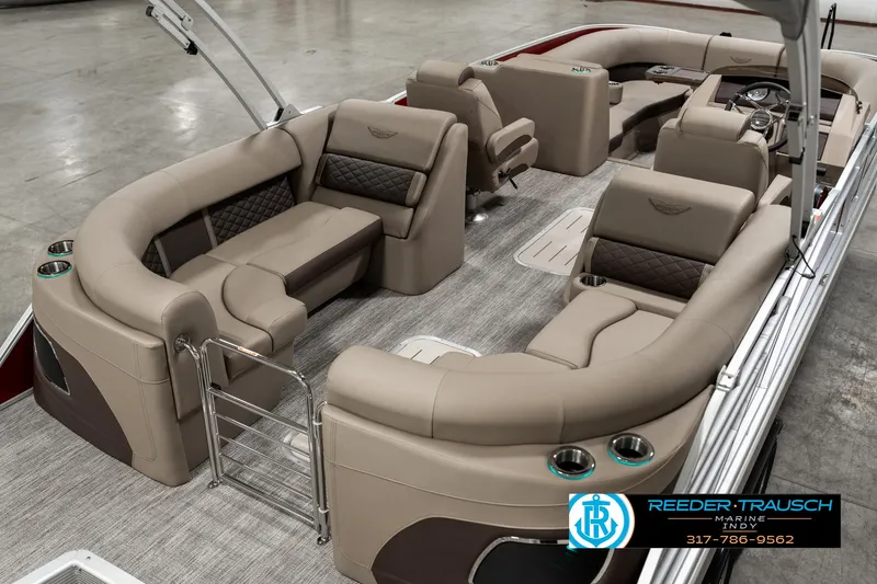 Slide: The Image of 2025 Bennington 25 LTFB pontoon boat interior with luxurious seating and modern design. - 11