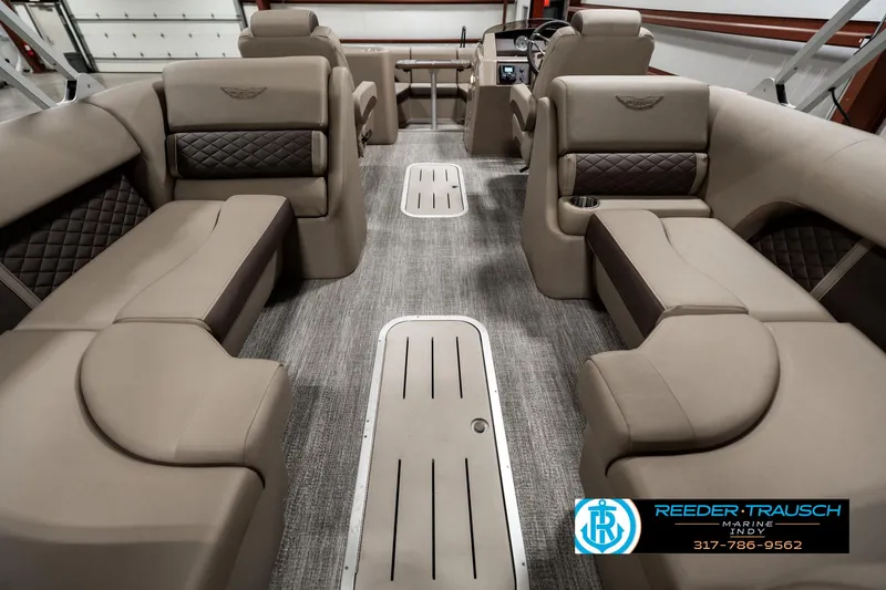Slide: The Image of 2025 Bennington 25 LTFB pontoon boat interior with luxurious seating and modern design. - 16