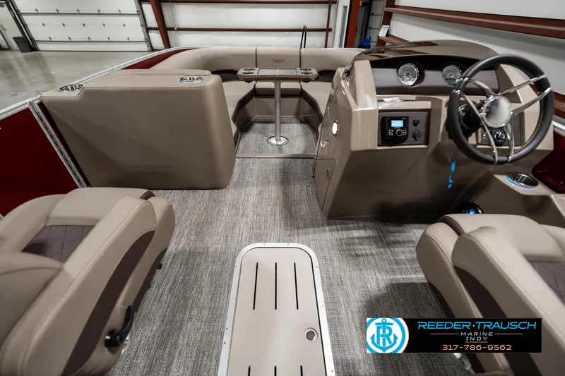 Slide: The Image of 2025 Bennington 25 LTFB boat interior with modern dashboard and seating. - 17