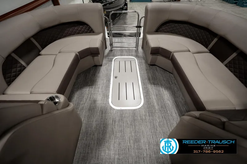 Slide: The Image of 2025 Bennington 25 LTFB boat interior with plush seating and modern design. - 24