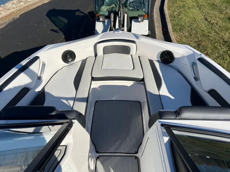 Slide: The Image of 2025 Yamaha Boats SX195 interior, featuring sleek seating and modern design. - 15