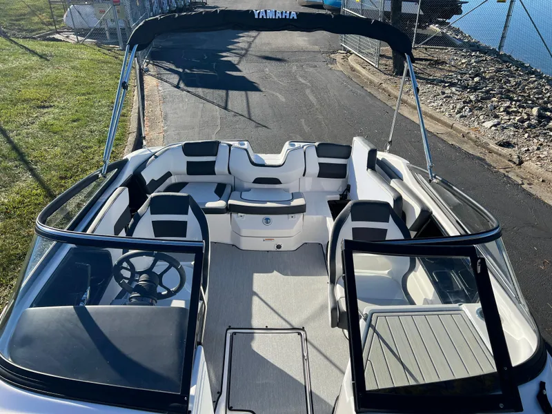 Slide: The Image of 2025 Yamaha Boats SX195 interior, sleek design with spacious seating and modern features. - 17