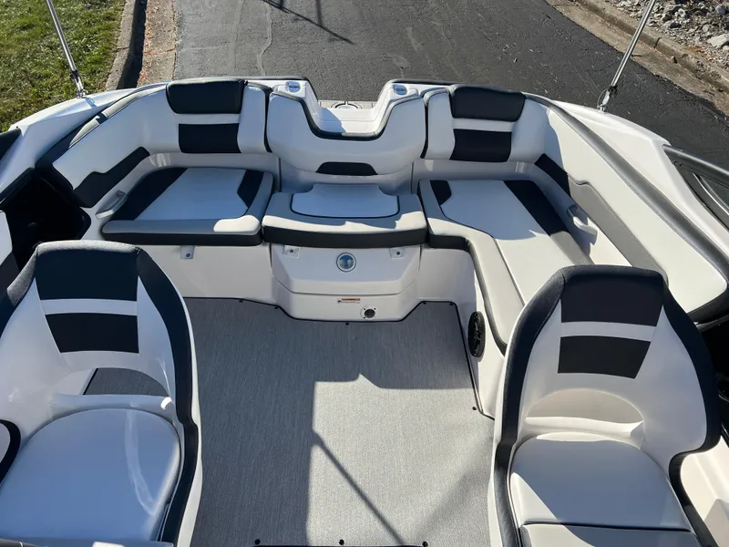 Slide: The Image of 2025 Yamaha Boats SX195 interior with sleek seating and modern design. - 18