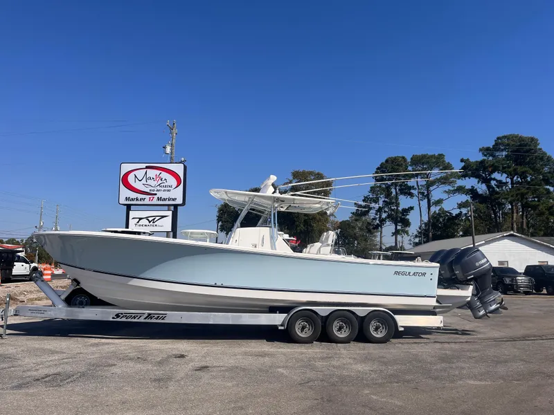 The Image of 2018 Regulator 34 boat on trailer at Marker 17 Marine dealership. - 0