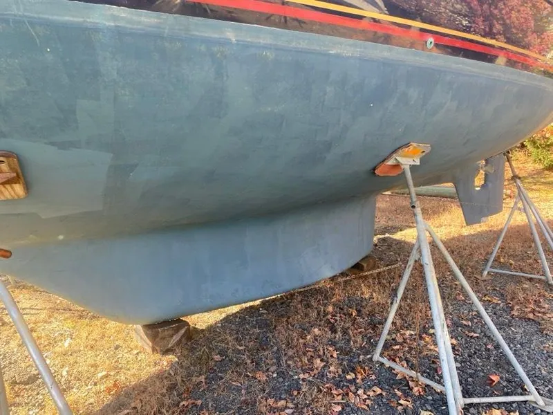 Slide: The Image of Pacific Seacraft 44 Voyager sailboat hull on stands, 1993 model, outdoors. - 20